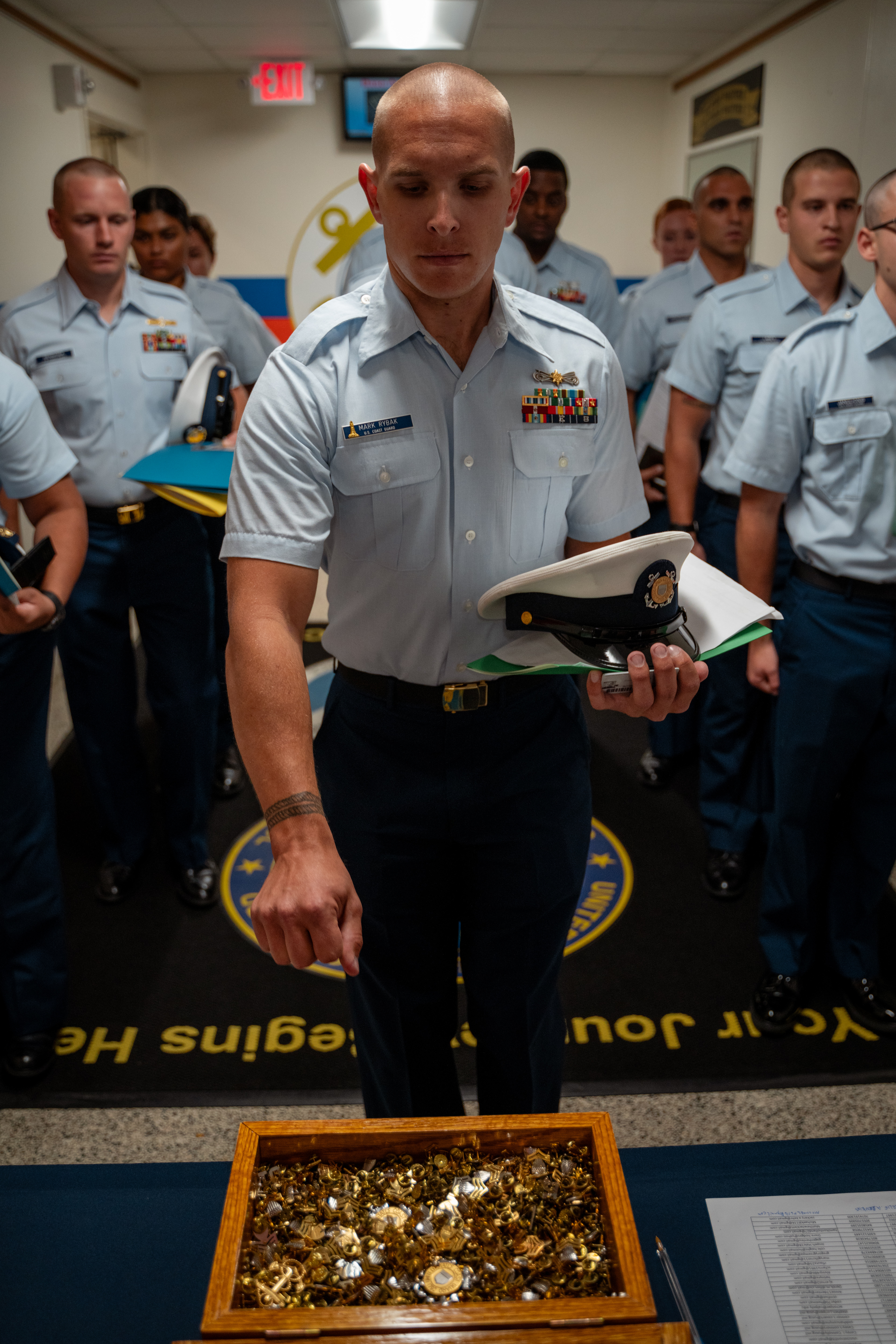 Members of Coast Guard Officer Candidate School (OCS) Class 1-25 and the National Oceanic and Atmospheric Administration (NOAA) Basic Officer Course (BOTC) 144 reported for training at the Coast Guard Academy, July 23, 2024. The future officers will go on to serve their respective branches across the nation as pilots, sailors, and scientific specialists. (U.S Coast Guard photo by Petty Officer 3rd Class Matt Thieme.)